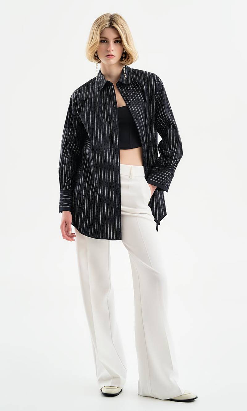Rhinestone-embellished cotton shirt in an oversized design in black in Copenhagen, Denmark