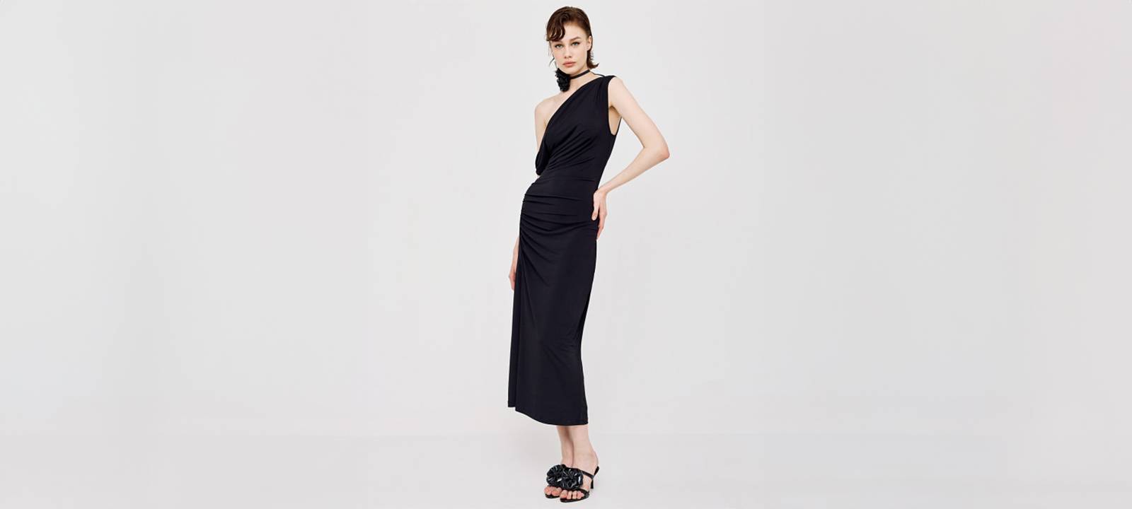 Shop long dress with gatherings in black in London, UK