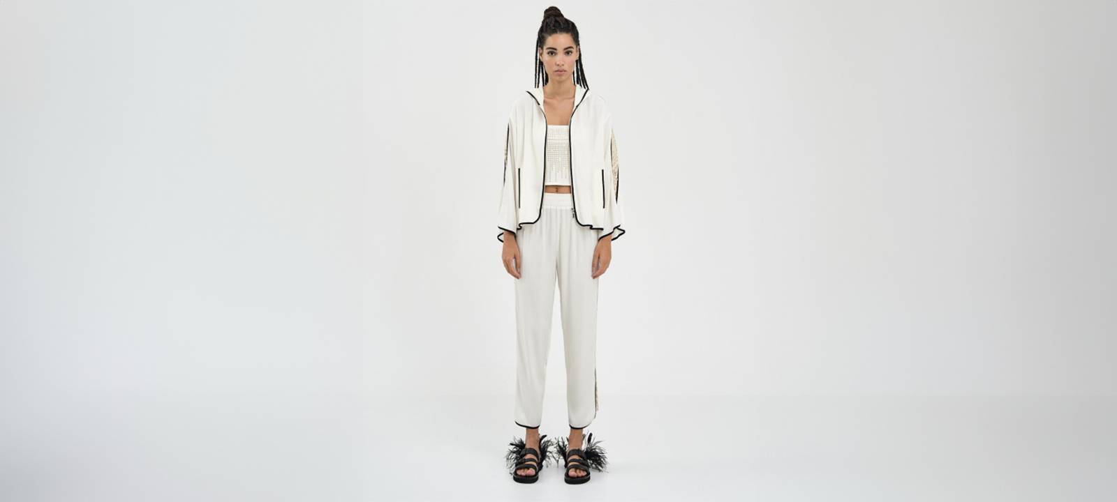 Shop leopard-patterned sequin detailed pants in white in Dublin, Ireland