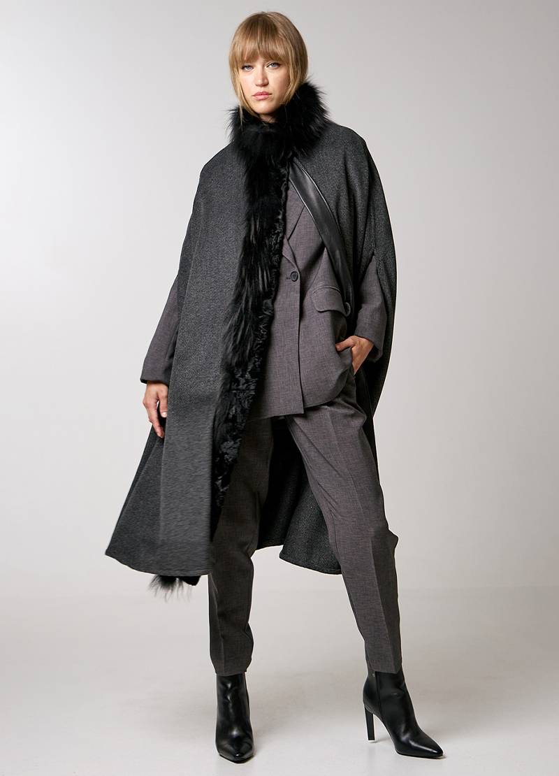 Cape in a herringbone pattern with fur details in grey in Brussels, Belgium