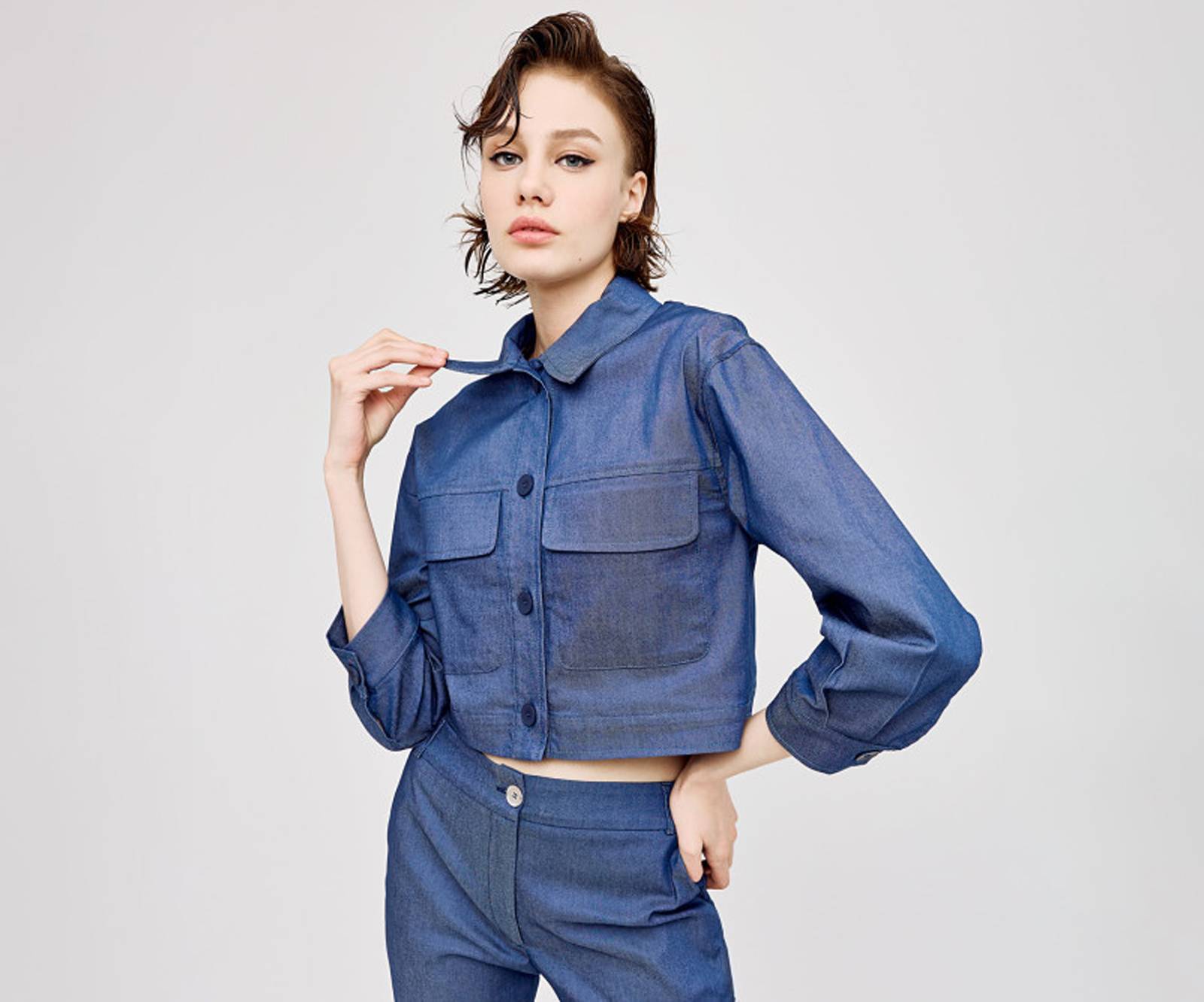 Denim, cropped jacket with a collar neckline and pockets in blue in Birmingham near Bristol