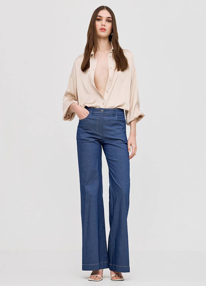 Denim flare pants with decorative seams in blue in Luxembourg