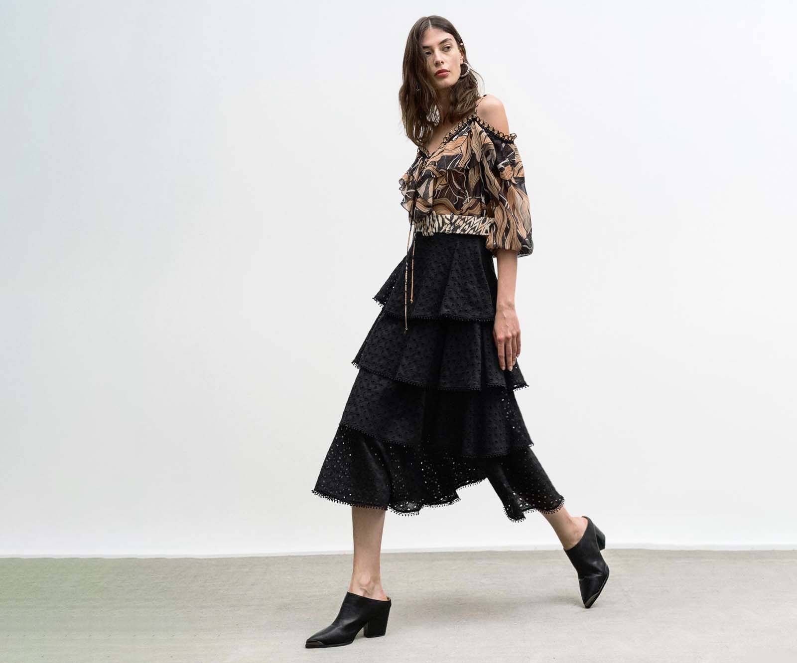 Ruffled mini embroidered skirt in black