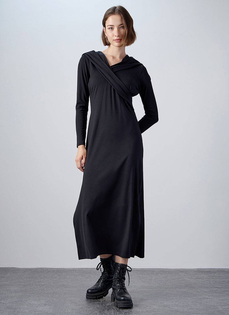 Hooded maxi dress with side slits and draped details in black in London, UK