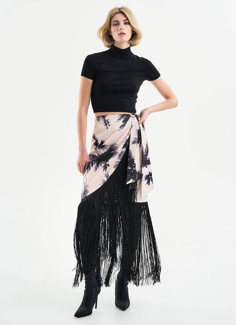Satin wrap skirt in a beige watercolor-inspired floral print with long fringe trims in Birmingham near Bristol