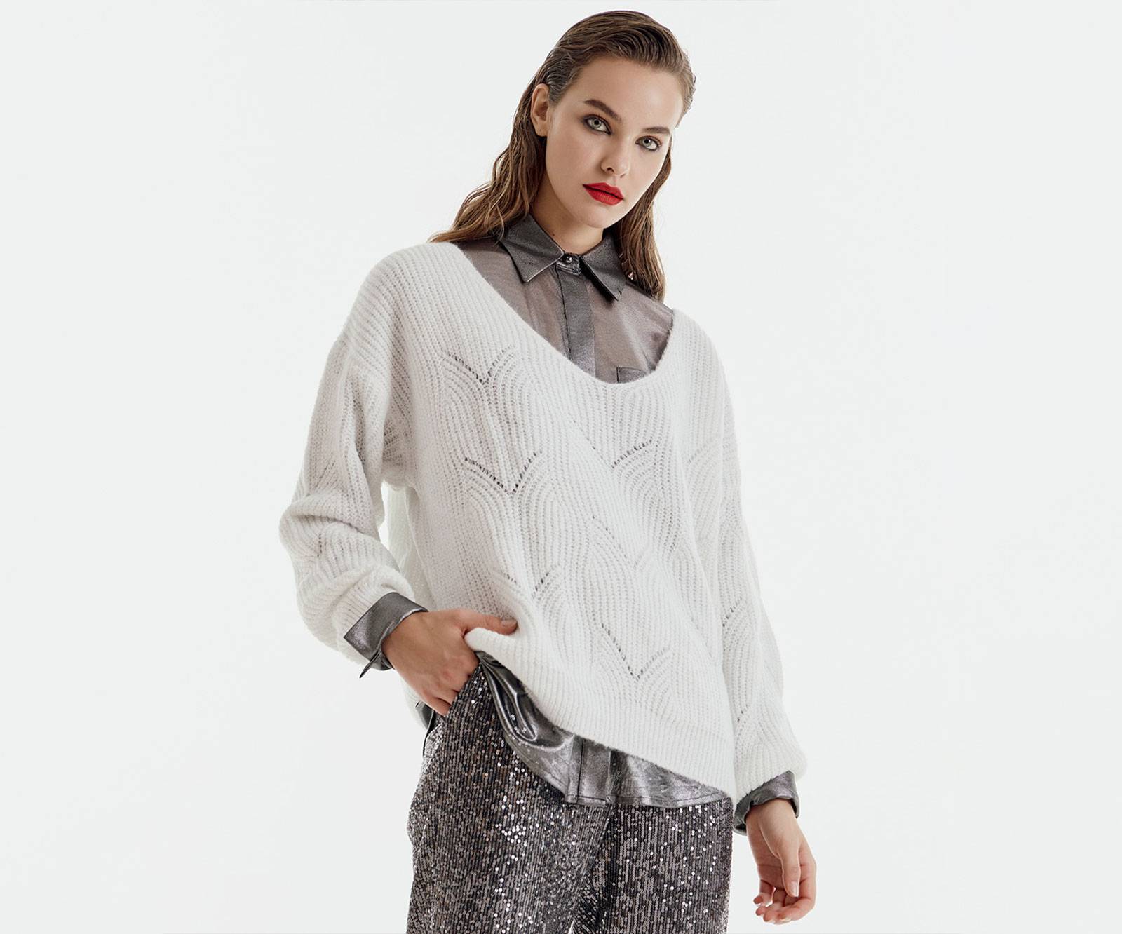 Oversized knitted sweater with V neckline and long sleeves with dropped shoulders in white in Glasgow near Edinburgh
