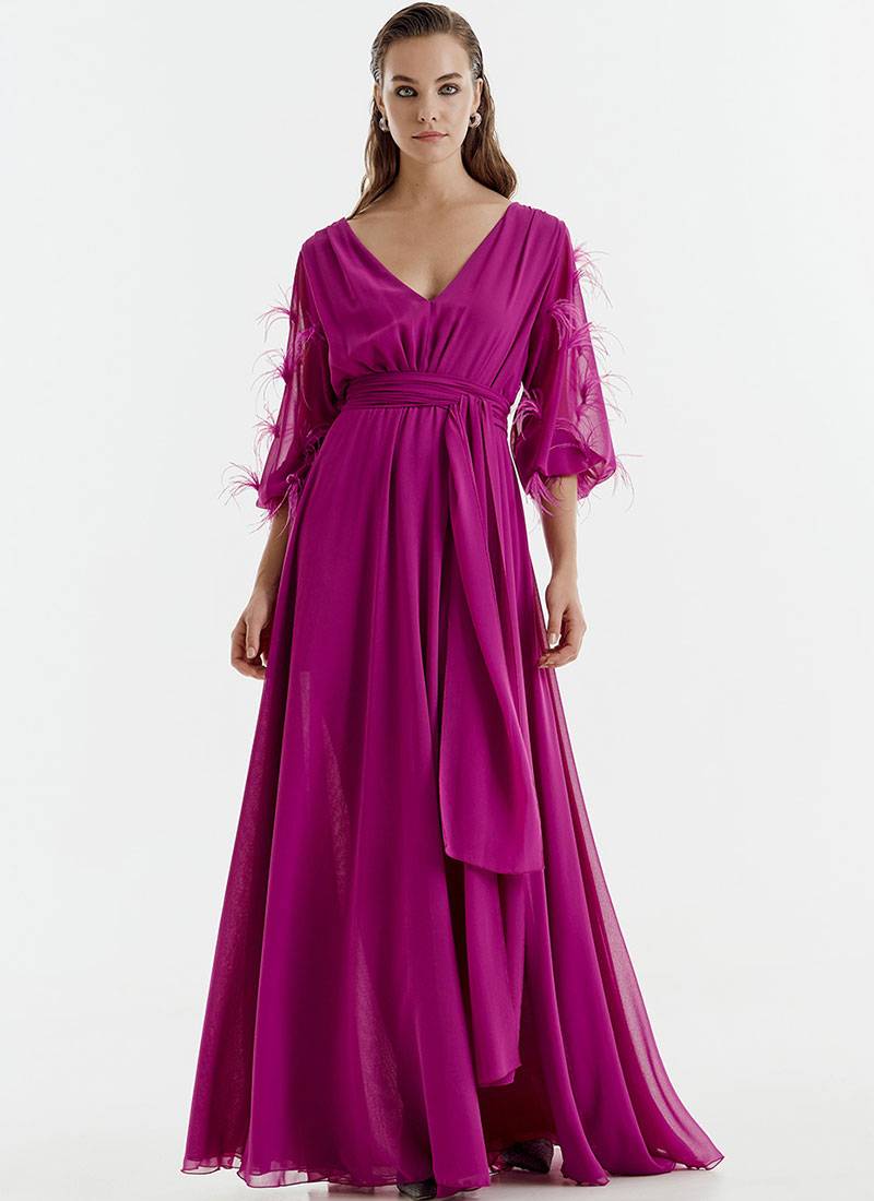 Maxi dress with feather-embellished sleeves in pink in Cardiff, UK