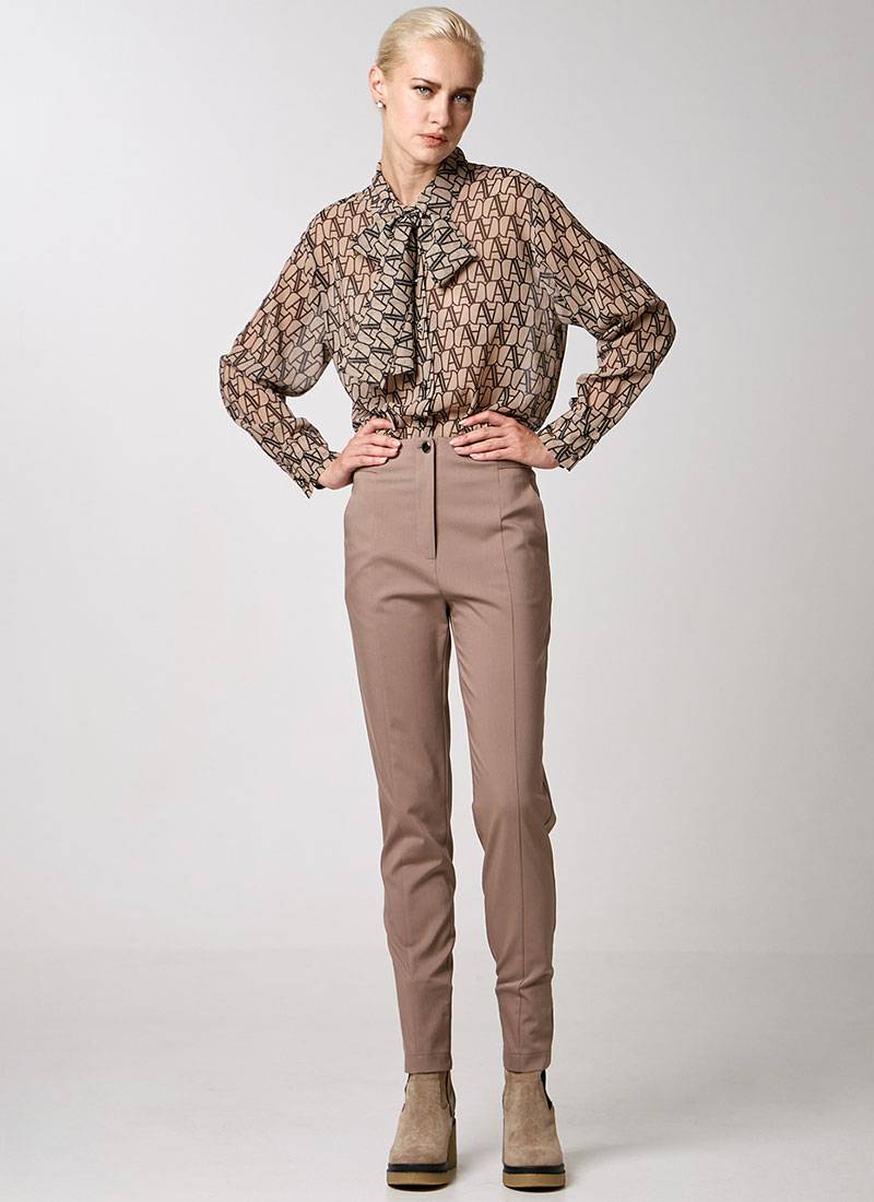 Oversized, semi-transparent shirt in a distinctive Access Fashion logo print in beige in London, UK