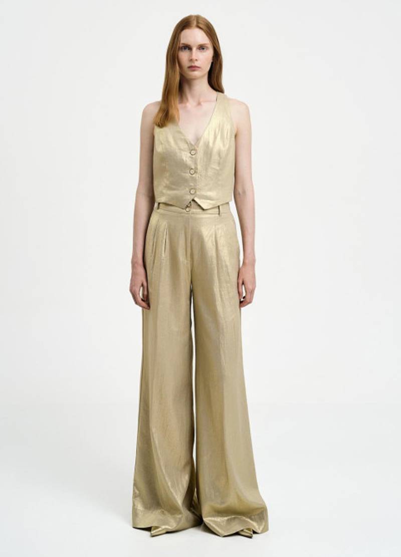 Metallic-effect vest top in gold in Leeds, UK