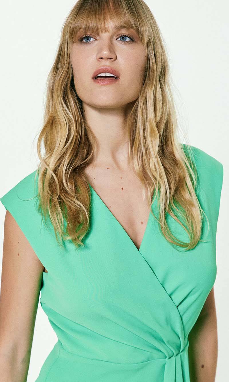 Green sleeveless midi dress in wrap design in Glasgow, UK