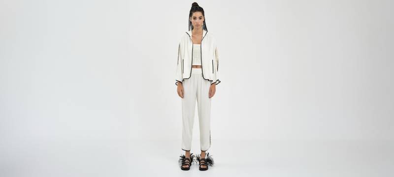 Shop leopard-patterned sequin detailed pants in white in Dublin, Ireland