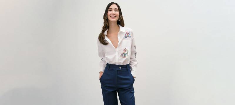Access Fashion staple white t-shirts to wear for your office days as a university professor in Leeds